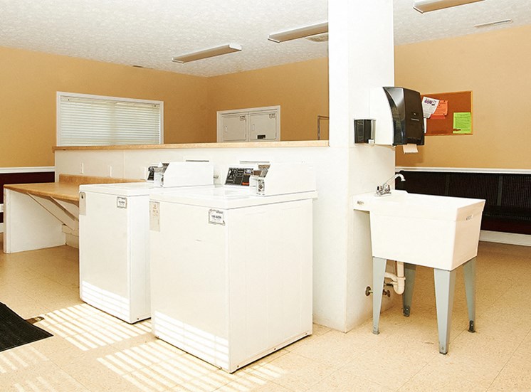 Coin-loaded washers and dryers available in the Resident Laundry Center